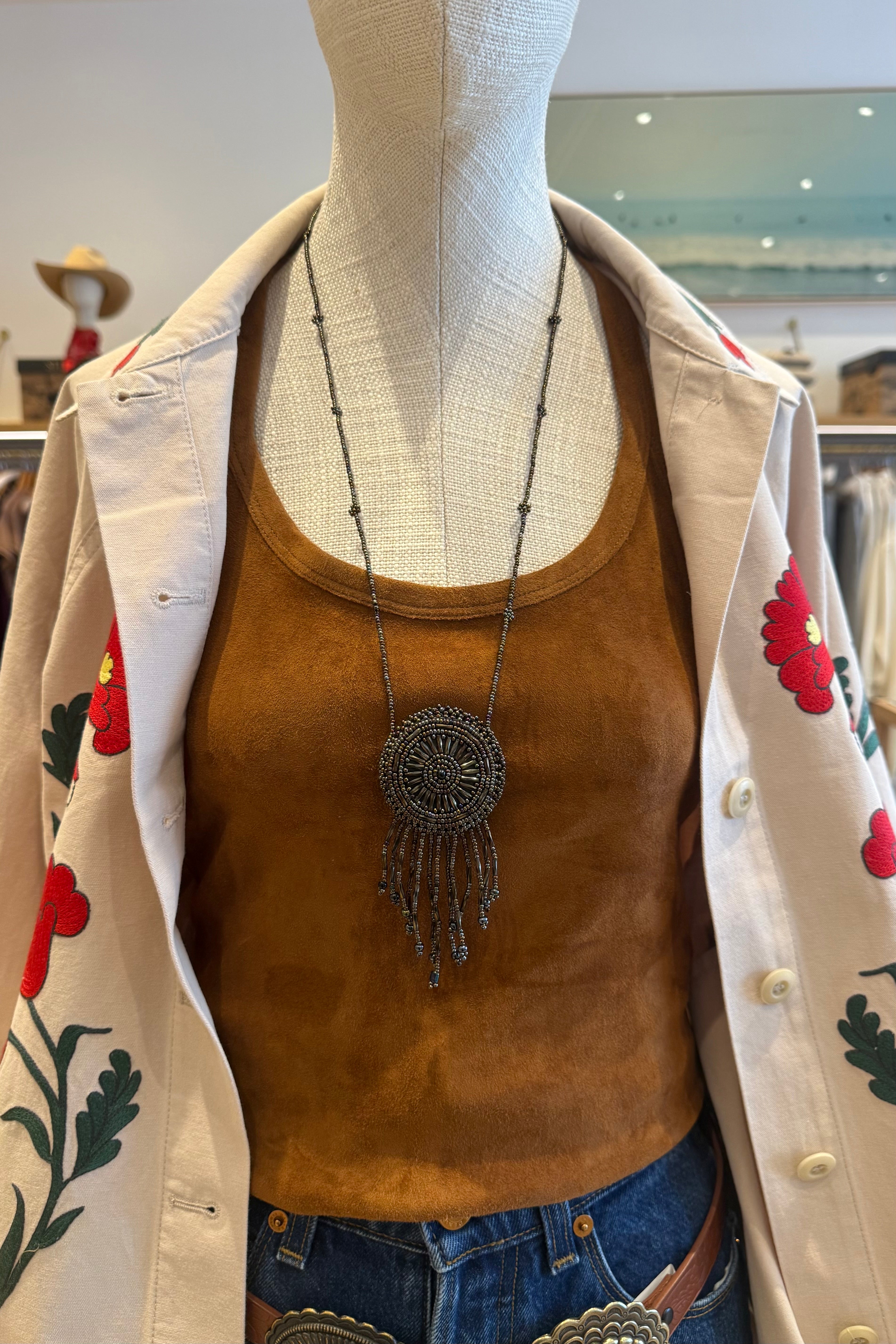 COLLIER MÉDAILLON PERLÉ MÉTALLISÉ CANON DE FUSIL