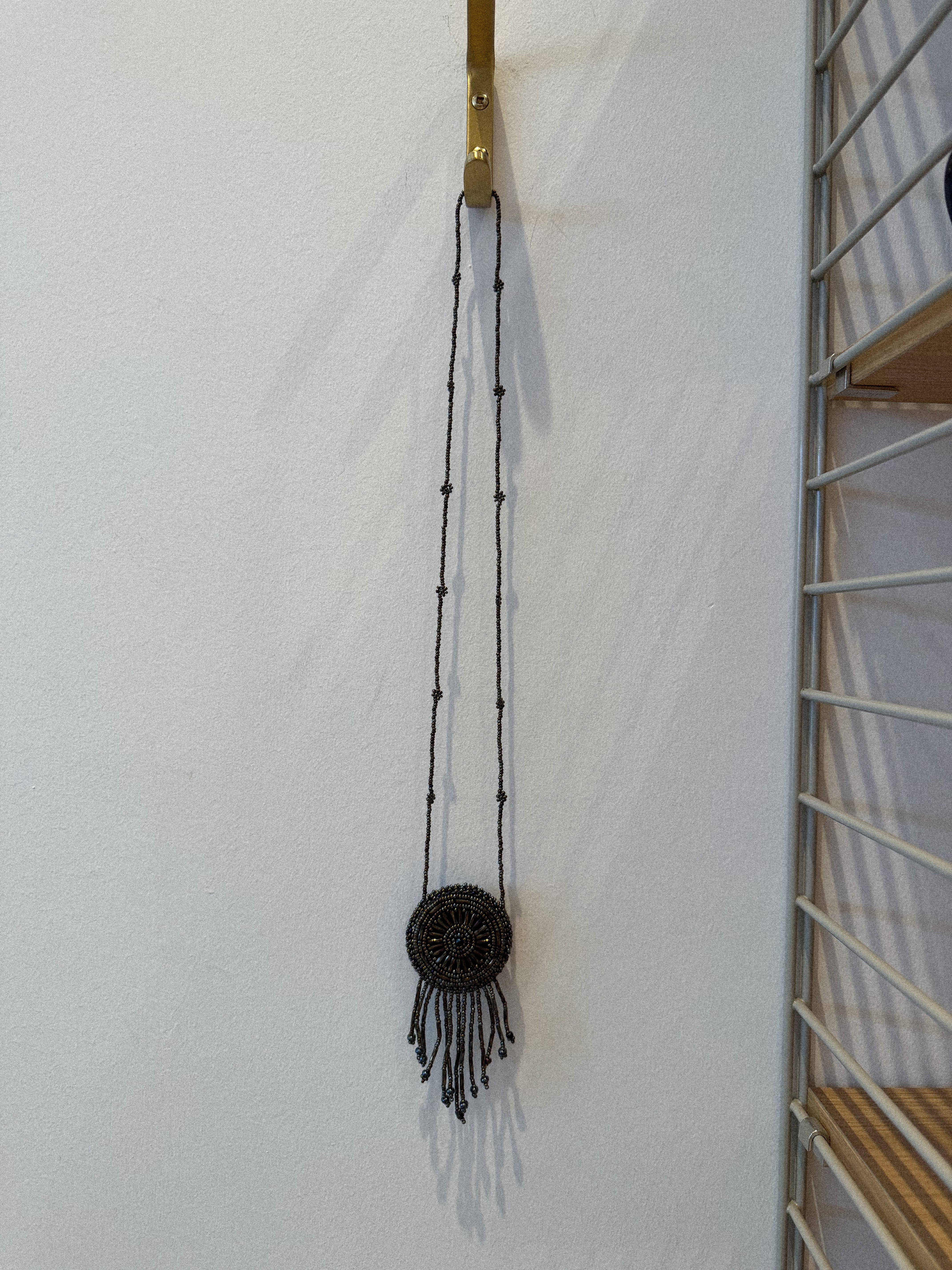 BEADED MEDALLION NECKLACE IN METALLIC GUNMETAL