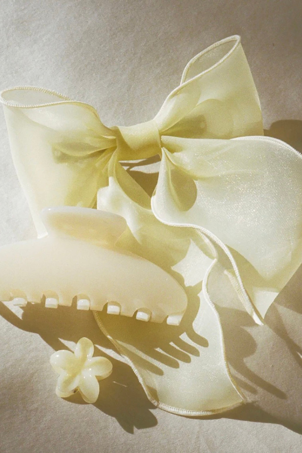 BOW BARRETTE IN PALE YELLOW